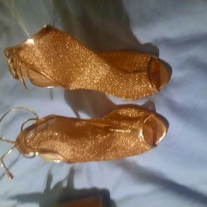Gold color heel shoes